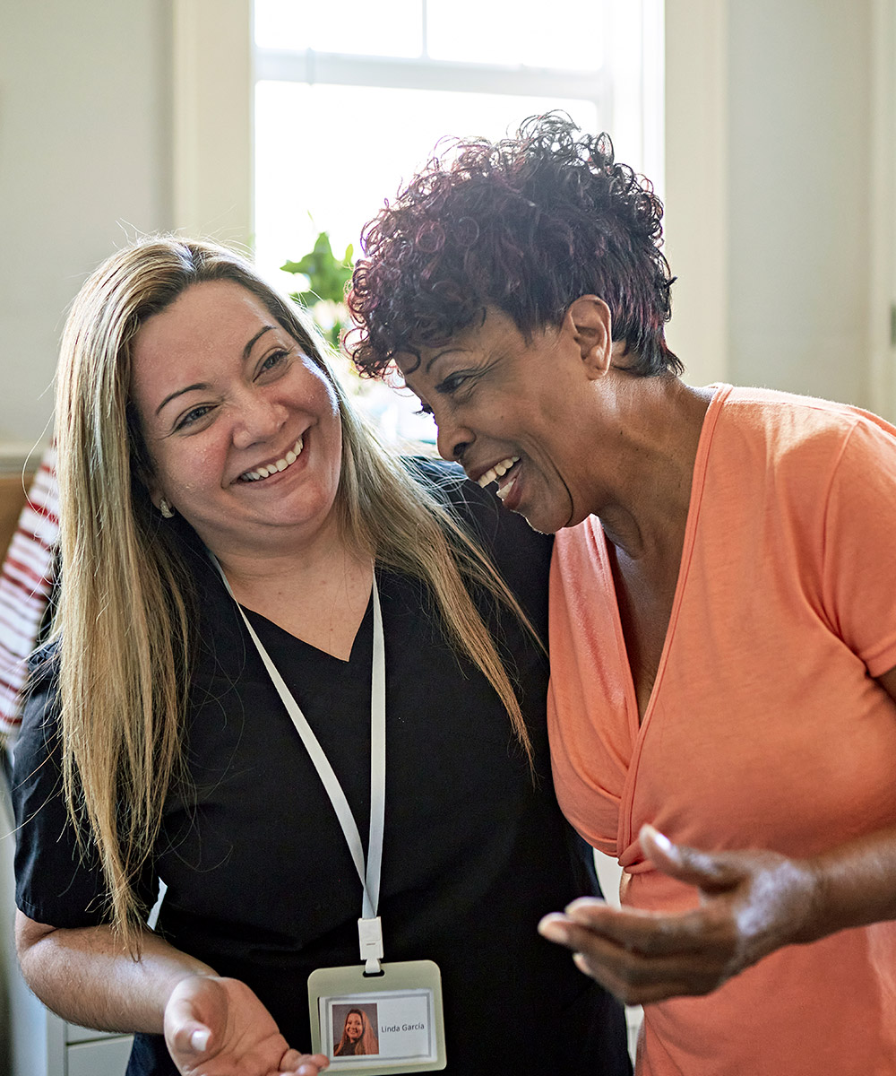 Two women laughing